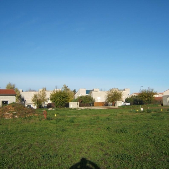 Réseau Immo-diffusion : Terrain ROMANS-SUR-ISERE (26100) m2  93 000 € 