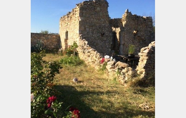 Réseau Immo-diffusion : Terrain  GUZARGUES   20 000 € 