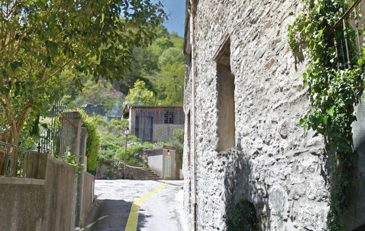 Réseau Immo-diffusion : Maison de village  SAINT-LAURENT-LE-MINIER  296 m2 129 000 € 